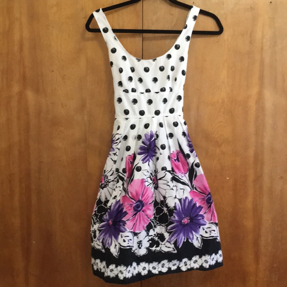 Snap; floral/ polka dot knee length dress.